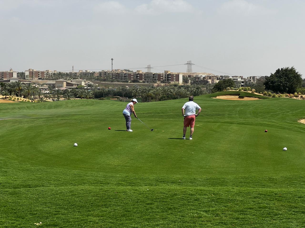 Championship golf fairway in Cairo with desert landscape